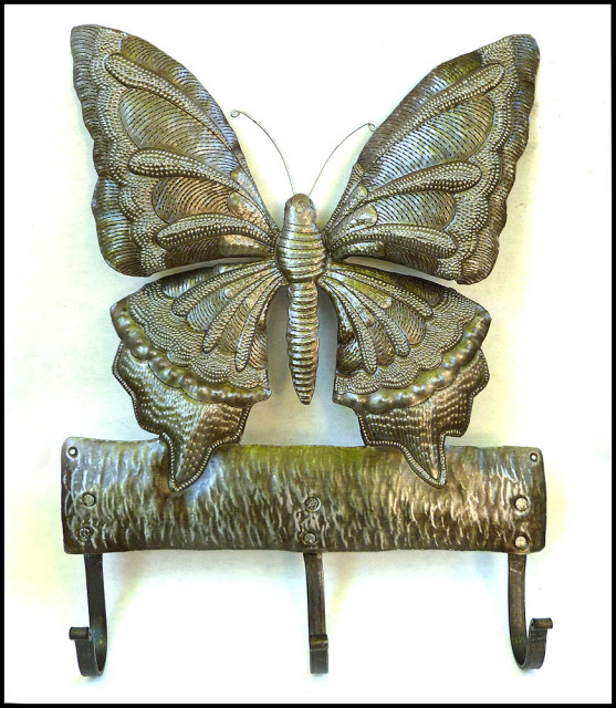 http://www.haitimetalart.com/i/Hooks/Butterfly_HOOK-_Haitian_steel_drum_art.jpg